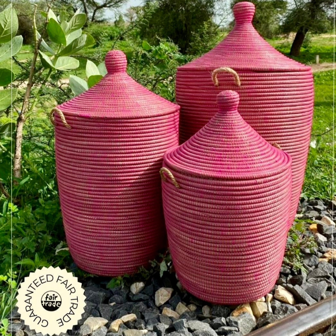 Raspberry colored laundry basket, hand braided with Senegal lid. Fair Trade