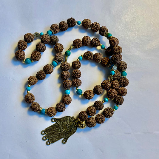 Mala pearl necklace, bean beads, turquoise pearl, gold plated links and a unique pendant