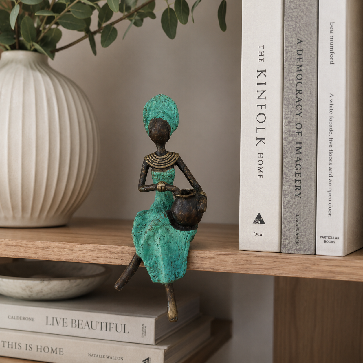 Sitting Woman – bronze sculpture, mint green dress, 15 cm