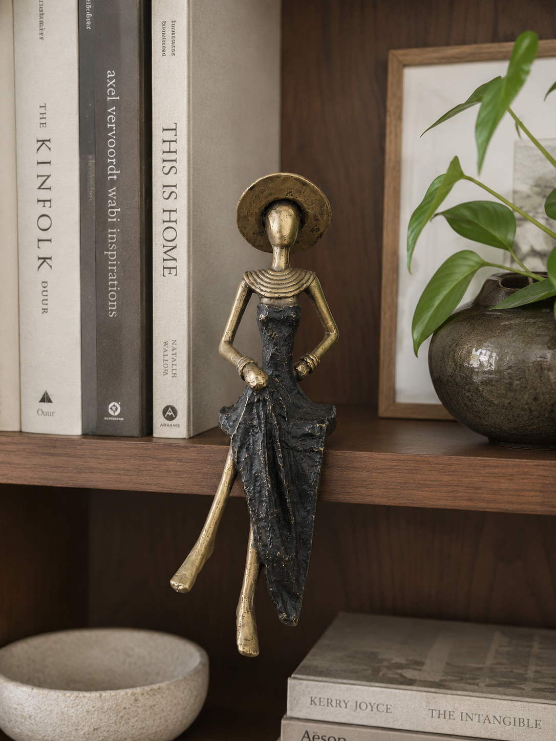 Reading Woman with Water – bronze sculpture, black dress, size 25 cm