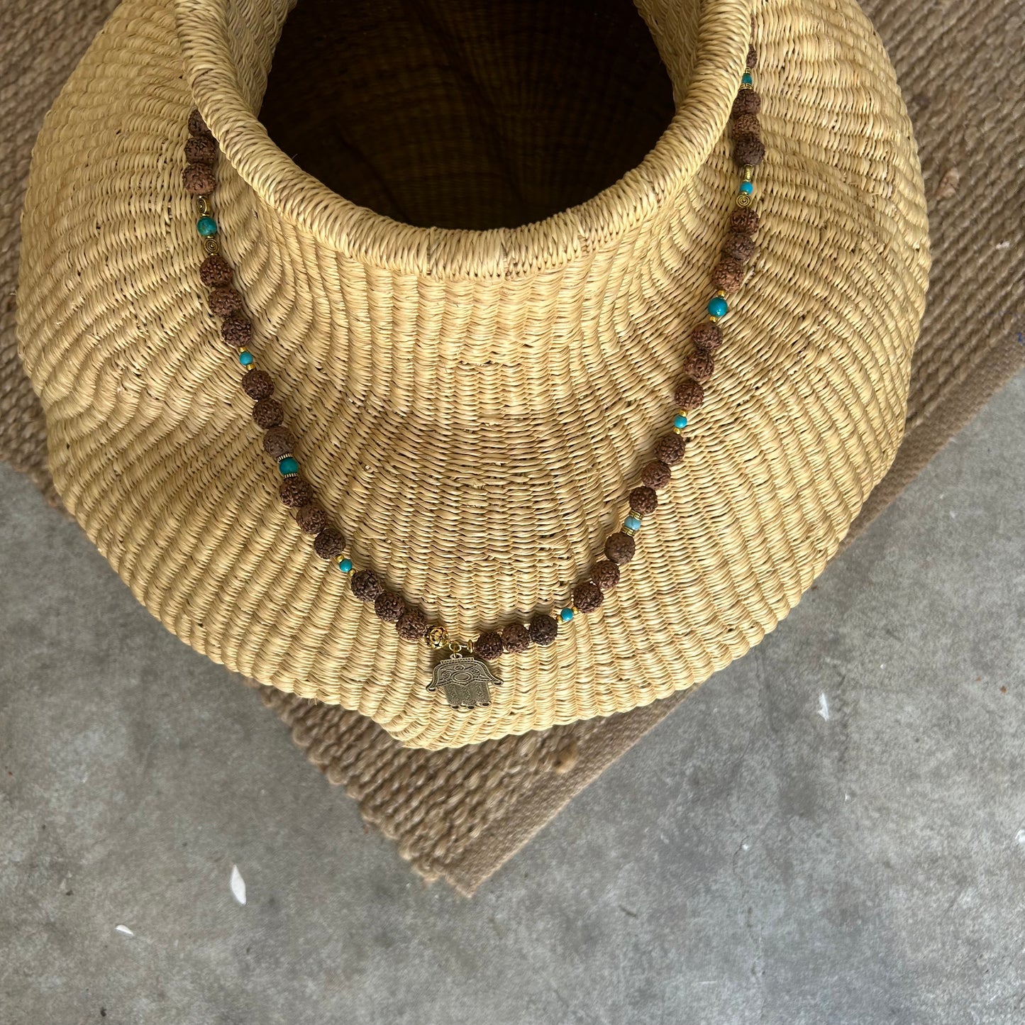 Mala pearl necklace, bean beads, turquoise pearl, gold plated links and a unique pendant