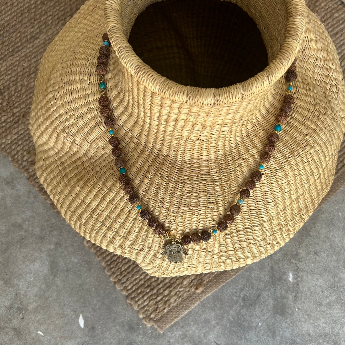 Mala pearl necklace, bean beads, turquoise pearl, gold plated links and a unique pendant