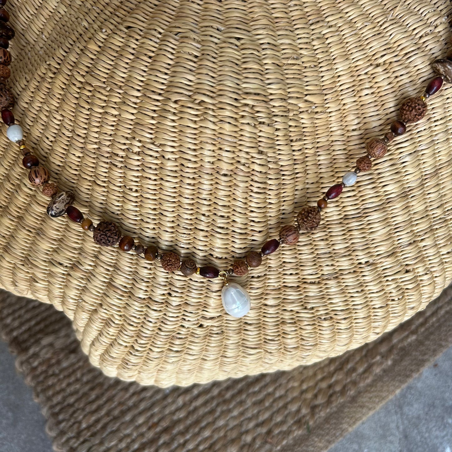 Mala bead necklace, polished wooden beads, bean beads and shell bead pendant