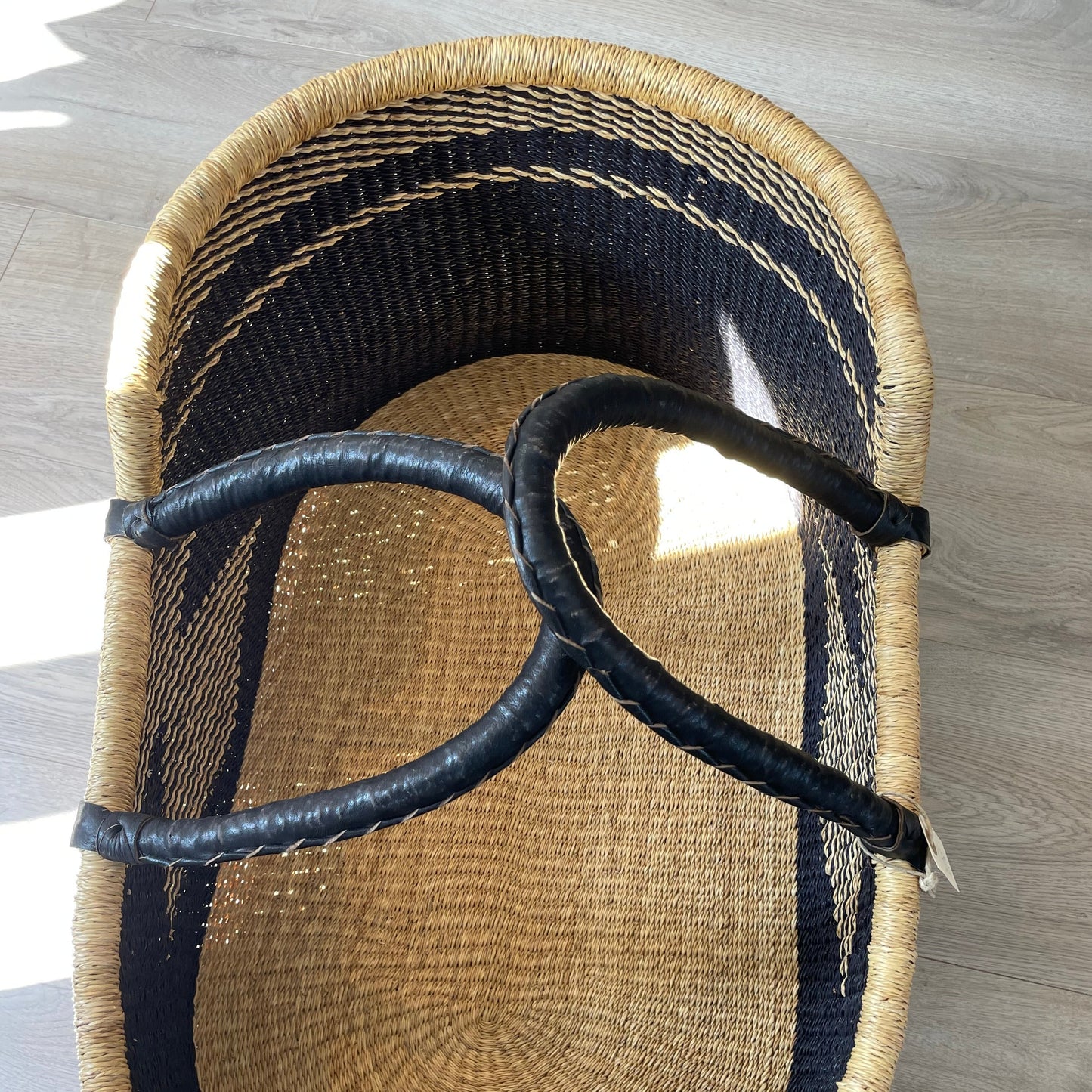 Baby lift (moss basket), woven in elephant grass, sustainable and Fair Trade from Ghana