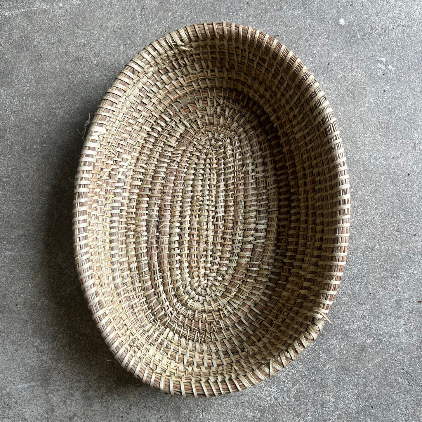 Bread tray in colorful patterns. Oval. Handwoven. Fair Trade from Senegal