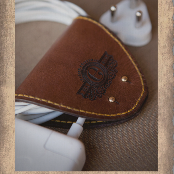 Mobile phone accessories, cord-collector in leather, South Africa