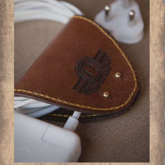 Mobile phone accessories, cord-collector in leather, South Africa