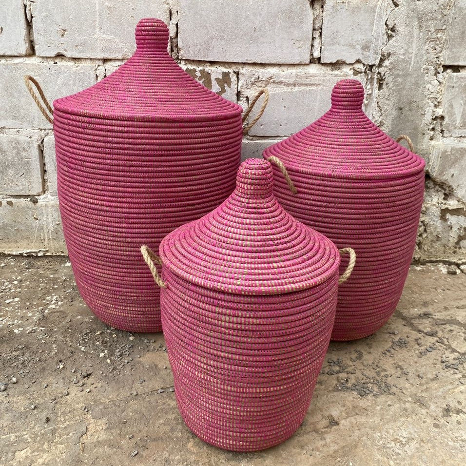 Raspberry colored laundry basket, hand braided with Senegal lid. Fair Trade