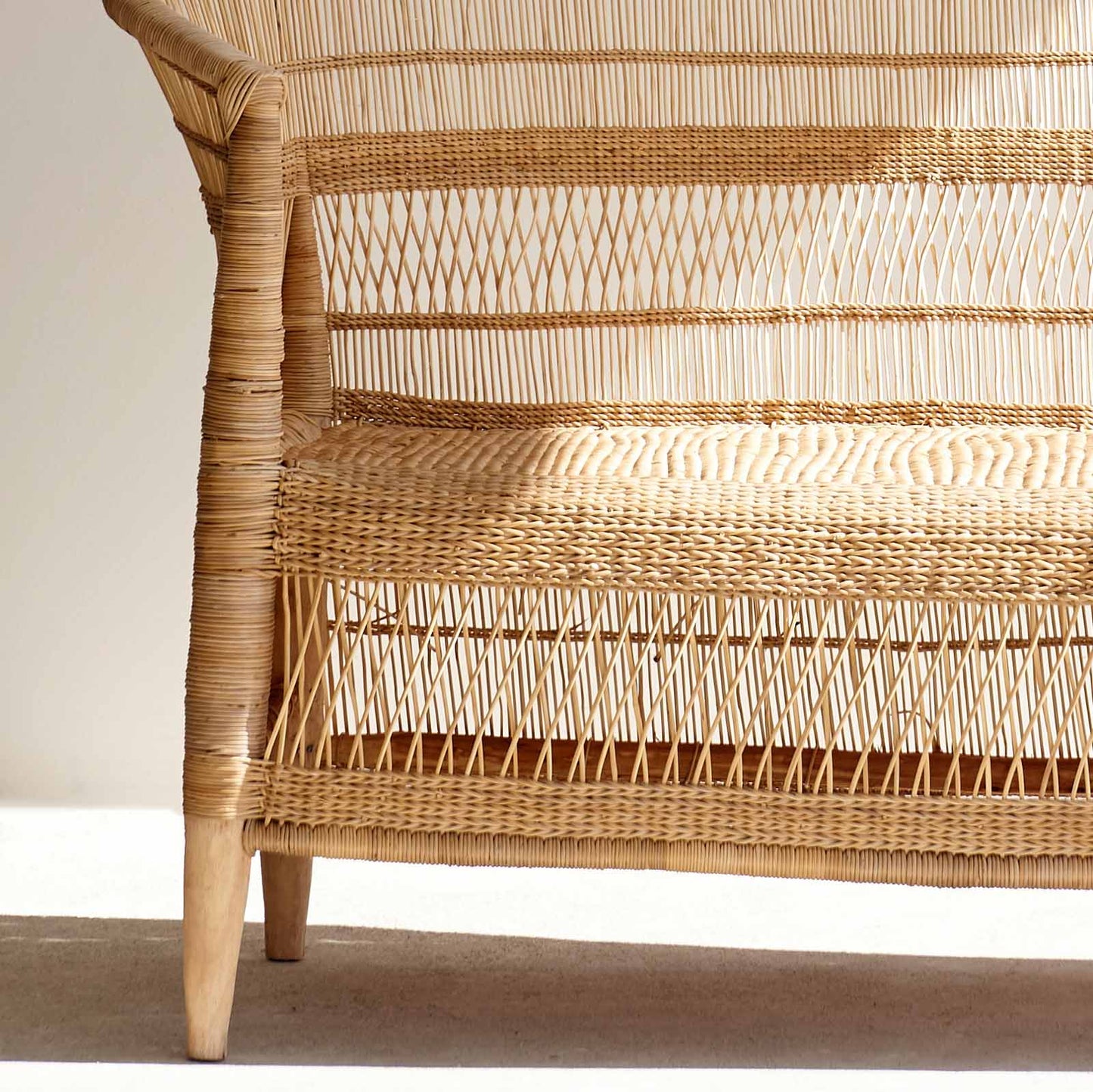 Malawi cane two-seater sofa, handwoven in rattan and bamboo. Sustainable and Fair Trade from MalawiMalawi