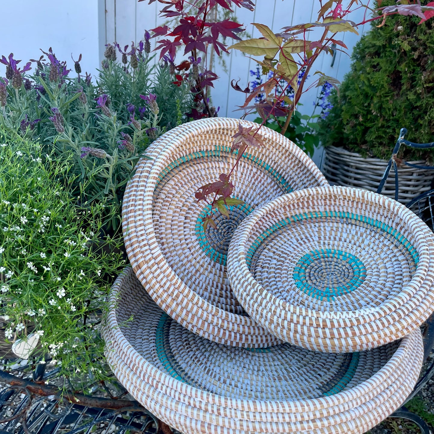 Bread basket / serving tray. Handwoven in elephant grass with recycled plastic thread. Three sizes. Turquoise. Fair Trade from Senegal
