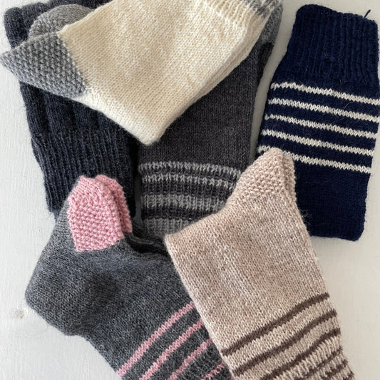 Woolen socks hand-knitted from local wool by earthquake-affected women. Fair Trade from Afghanistan