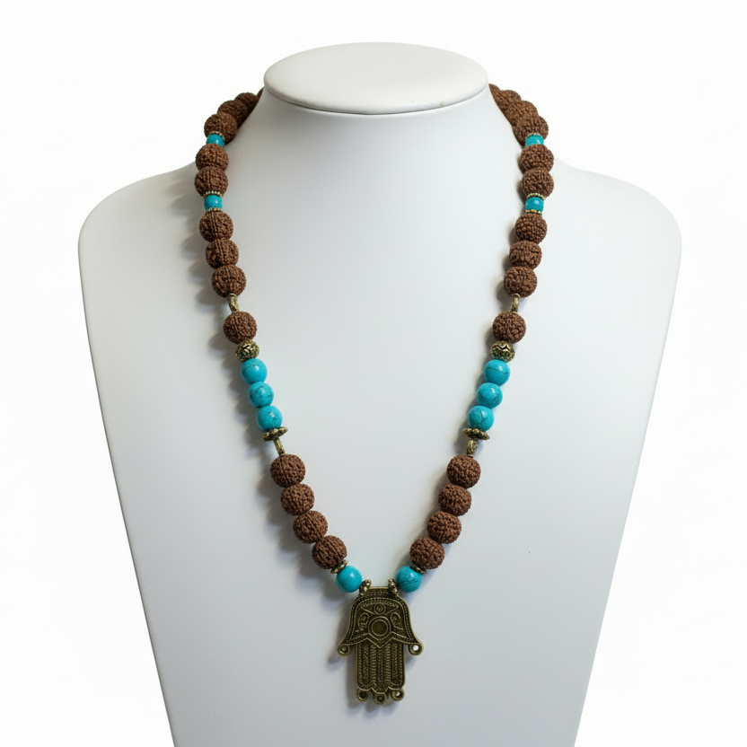 Mala pearl necklace, bean beads, turquoise pearl, gold plated links and a unique pendant