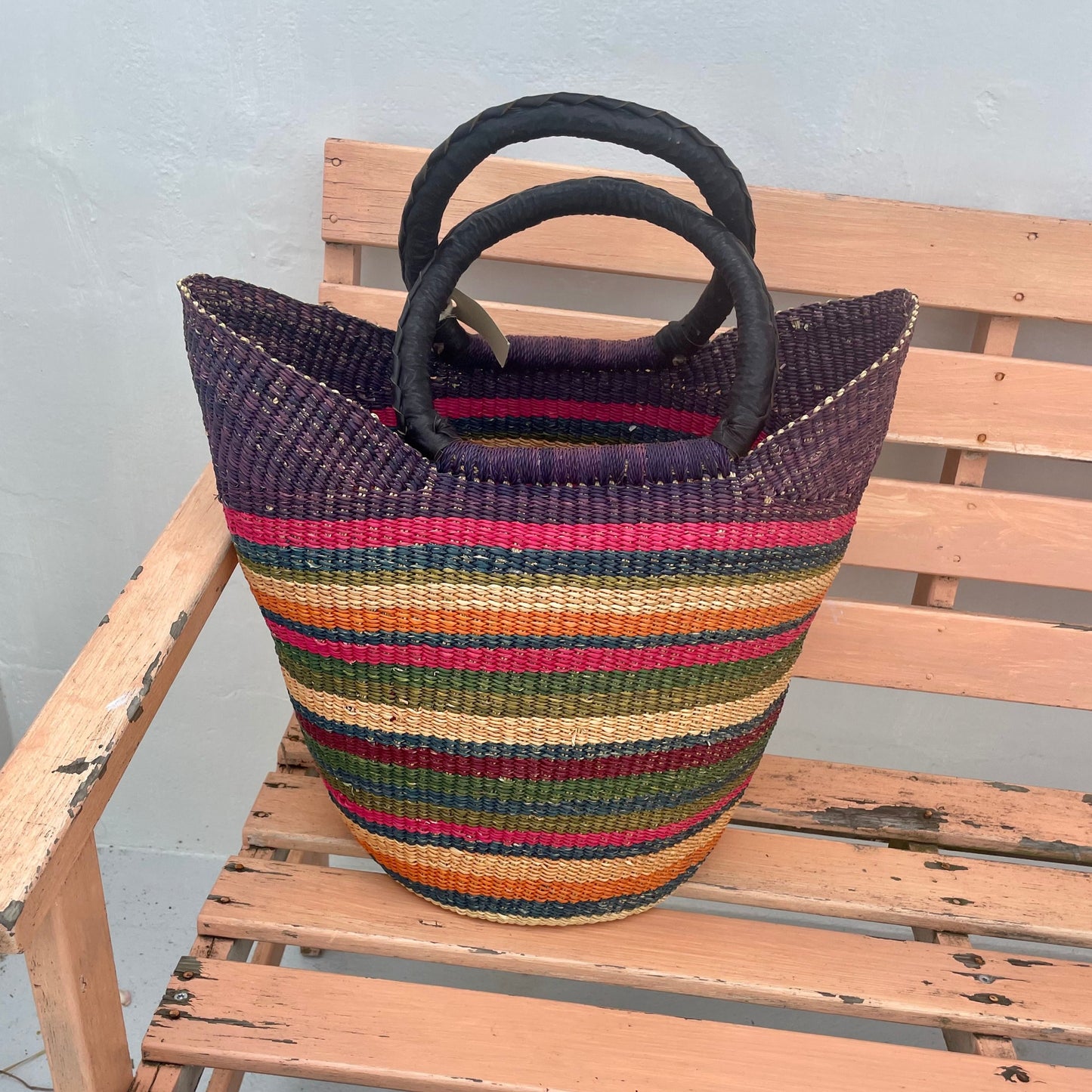 Bag braided with elephant grass multi colored in stripes. Leather handle. Fair Trade from Ghana