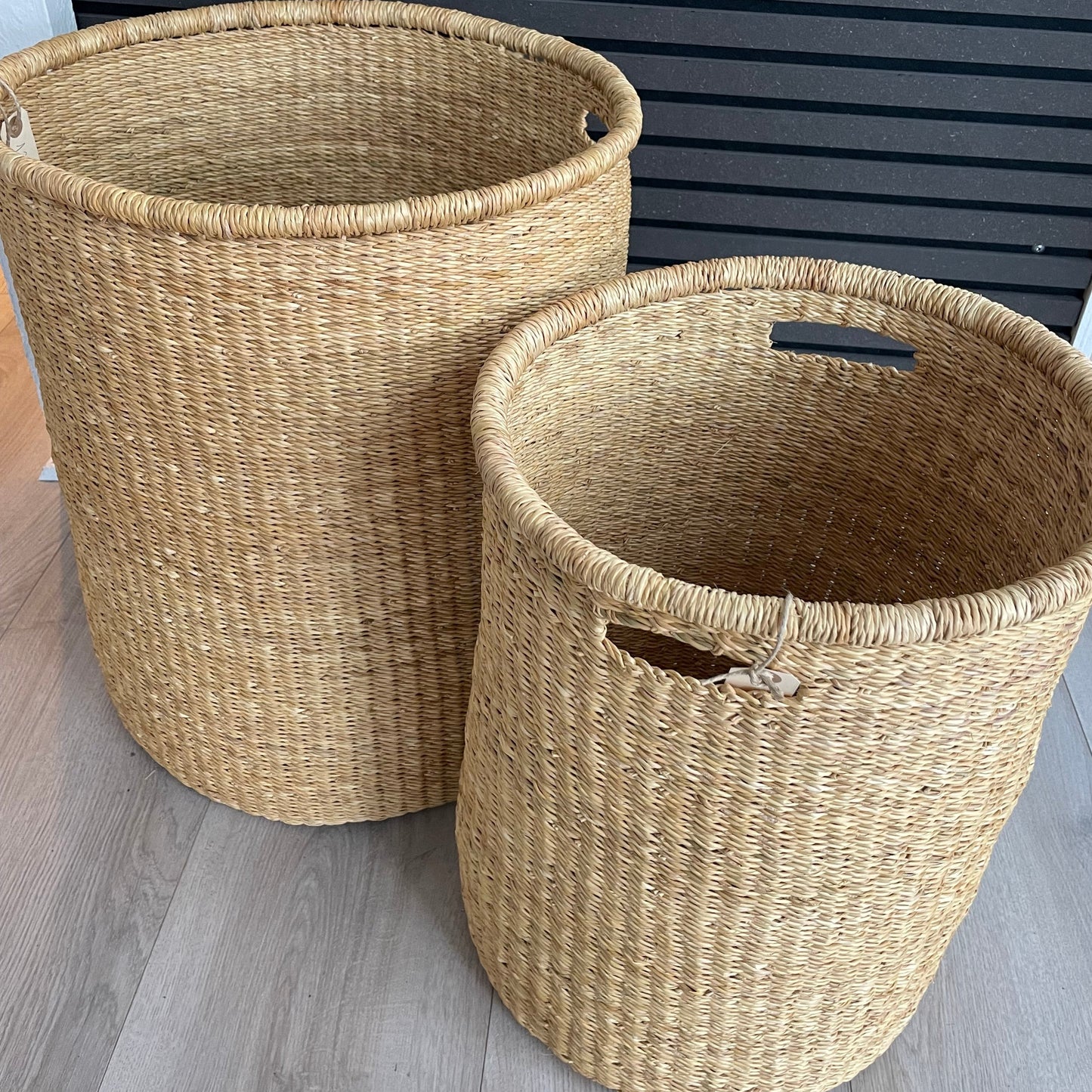 Laundry basket in woven elephant grass in three sizes. Handmade and Fair Trade from Ghana