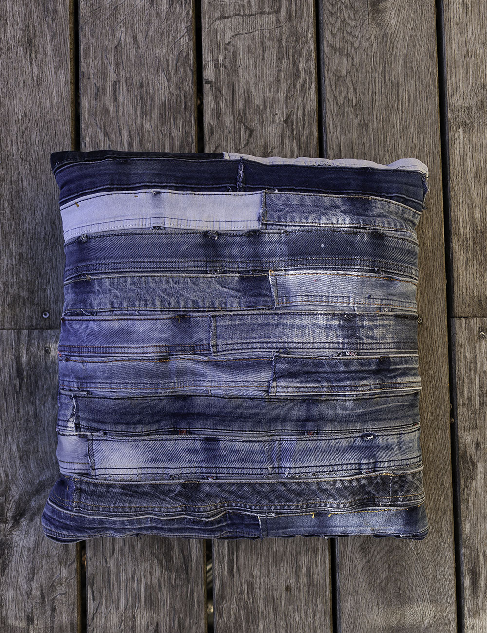 Cushion cover made from "dead stock" denim fabric in India