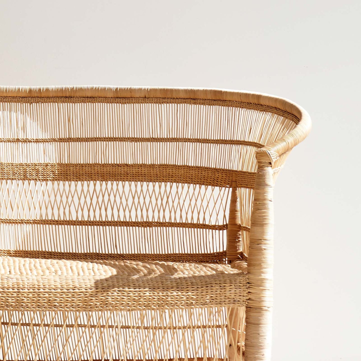 Malawi cane two-seater sofa, handwoven in rattan and bamboo. Sustainable and Fair Trade from MalawiMalawi